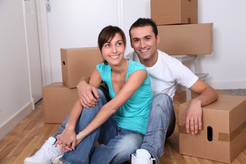 Packing and transporting office equipment by relocation services