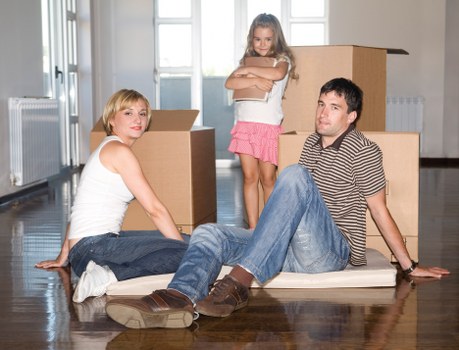Local movers assisting with office furniture setup